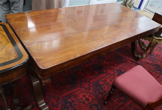 A 19th century French mahogany centre table on X end standards L.186cm